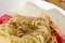 Pasta spagetti with tomato and cheese in french mustard.