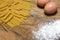 Pasta, spaghetti and sedani with flour and eggs. Typical ingredients of Italian cuisine. closeup