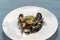 Pasta squid ink with mussels