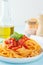 Pasta tagliatelle or fettuccine with tomato and red bell pepper