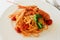 Pasta with tomato sauce and langoustines