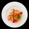 Pasta with tomato sauce and langoustines, isolated