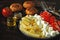 Pasta with tomatoes and white cheese. Vegetarian bowl with pasta, tomatoes and feta.