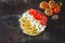 Pasta with tomatoes and white cheese. Vegetarian bowl with pasta, tomatoes and feta.