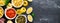 Pasta. Various kinds of uncooked pasta and noodles over stone background. Banner.