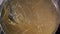 pasta, a young woman cooks spaghetti in hot water in a saucepan, close-up