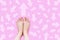 Pastel Arrow Choice Different. Woman Bare Feet with Pink Nail Polish Manicure Standing and Many Direction Arrows Choices on Pink