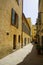 Pastel buildings on narrow street of Ajaccio