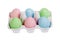 Pastel colored easter eggs in cardboard, isolated