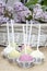 Pastel colors cake pops on hessian