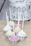 Pastel colors cake pops on hessian