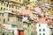 Pastel houses of Riomaggiore, the largest of the five centuries-old villages of Cinque Terre, Italian Riviera, Liguria, Italy