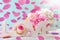 Pastel love background with falling rose petals