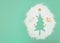 Pastel mint concept. Christmas tree silhouette. with copy space. New Year's decorations