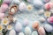 Pastel painted Easter eggs create delightful top view flat lay background