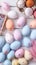 Pastel painted Easter eggs create delightful top view flat lay background