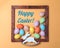 Pastel scattered Easter eggs framed with bunny