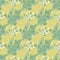 Pastel seamless naive pattern with branches and abstract floral silhouettes. Yellow background, light green elements