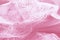 Pastel silk lace lingerie, pink color background
