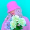 Pastel vanilla girl with flowers in trendy bucket hat. Sweet and bloom summer mood