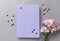 pastel violet blank notebook, flowers and stars confetti