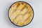 Pastiera napoletana, the traditional Easter cake from Naples on white background