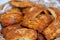 Pasties filled with minced meat and sesame seeds