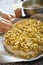 Pastilla filling preparation with chicken spreaded by hands