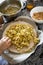 Pastilla filling preparation with chicken spreaded by hands