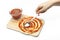 Pasting pizza sauce on pizza dough [isolated white background]