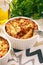 Pastitsio -greek casserole with pasta, meat, tomatoes and feta cheese.