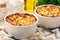 Pastitsio -greek casserole with pasta, meat, tomatoes and feta cheese.