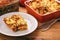 Pastitsio -greek casserole with pasta, meat, tomatoes and feta cheese.