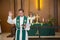 Pastor blesses the eucharist during Sunday mass at Lutheran Chu