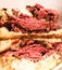 Pastrami slices in Reuben sandwich - closeup photography