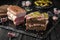 Pastrami, tenderloin smoked beef or pork with spices. Sliced appetizer for wine, for sandwiches, or a feast.