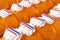 Pastries with orange icing glaze, whipped cream and dutch flags