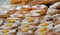 Pastries with pastry cream and sugar on sale from bakeries