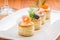 Pastries with salmon, caviar and shrimps