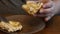 Pastry being prepared to eat on a wooden table