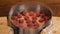 Pastry chef making raspberry cream cake with jelly, close up.