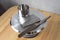 Pastry chef\\\'s tools lie on a rotating table. Spatula, spatula and cake pan