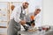 Pastry chefs preparing desserts at table