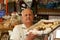 Pastry cook carrying his delicacies in Bazaar, Suleymani, Iraq, Middle East