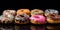 Pastry donuts with multicolored glaze. Promotional commercial photo.