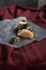 Pastry filled with cream, traditional french eclairs with chocolate on wooden table, selective focus