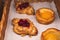 Pastry, selection assortment variety of different bakery, with croissant,  swiss rolls, cake, eclair and others in a basket or a