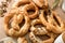 pastry snack pretzels with sesame and salt at local bakery