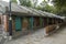 Pat Kan Uk Houses, an eight-unit huts in Stanley with tiled gable roofs, which are joined together forming a row