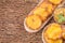 Patacon or toston fried and flattened pieces of green plantain, traditional snack or accompaniment in the Caribbean, guacamole and